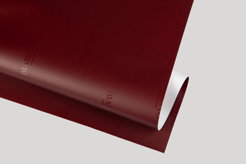 Plastic-coated paper